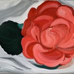 A Rose in a Glass Dish.