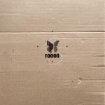 A spray painted print of the silhouette of a butterfly shaped as a barcode that is centered and engulfed by the negative space of the composition.