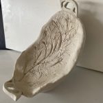 A rosemary imprinted hors d’oeuvres tray