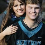 A photograph of a young couple, which includes my friend and his girlfriend in football jerseys to represent my friends number on the team. And the special bond and overall joy they have.