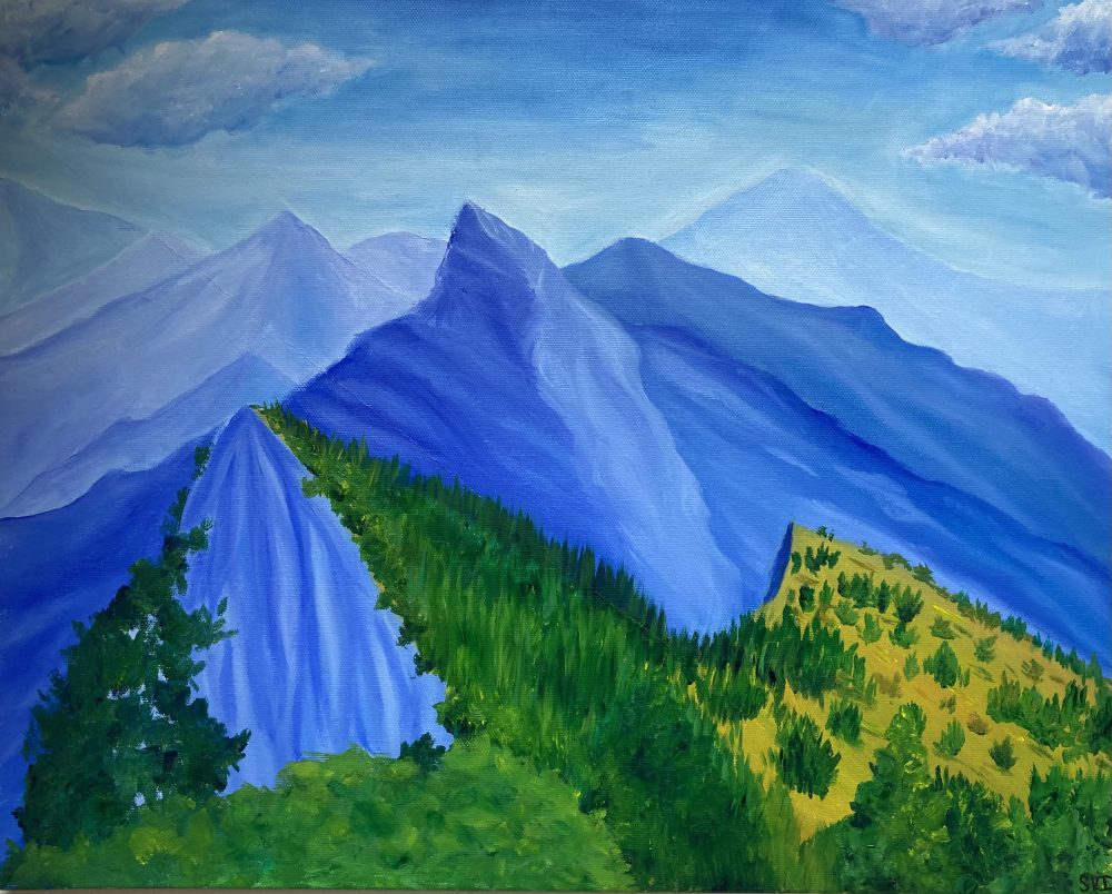 An oil painting using mostly blues and greens, of a mountain landscape and a blue sky. In the foreground there are lots of trees.