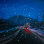 An acrylic painting, mostly comprised of darker blues, of a snowy evening drive through a wooded, winding road with cars in the background.