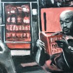 Black, white, and red image is of 2 individuals in a shop, one is reading and the other is onlooking.