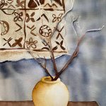 Watercolor painting of a vase of branches in front of a tapa cloth wall hanging.