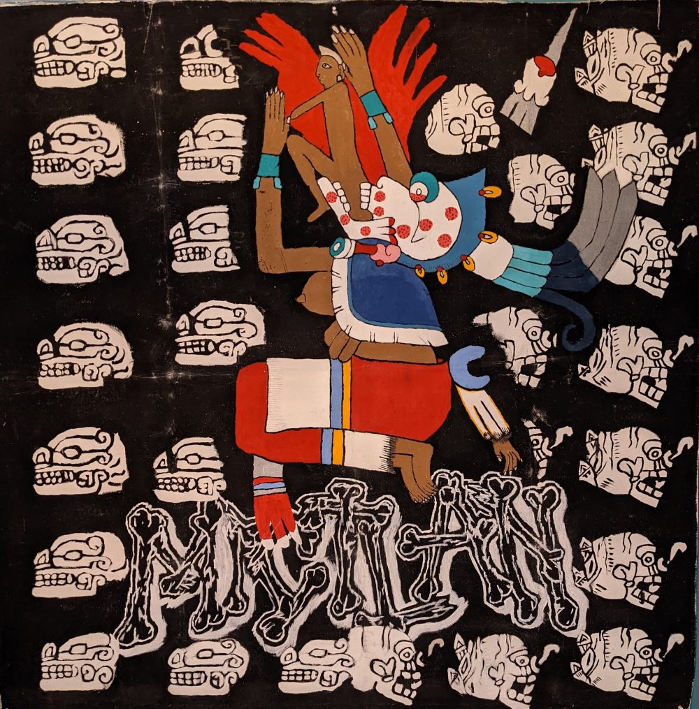 A painting depicting the Goddess Mictecacihuatl, coming out of her mouth is a representation of rebirth in the form of a small humanoid; surrounding her are white skulls on a black background and beneath her is the word "Mictlan" in bone lettering which is the indigenous name for the underworld.