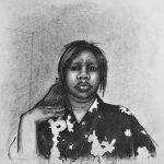 Portrait of a young female model with her hand on her shoulder, wearing a floral robe.