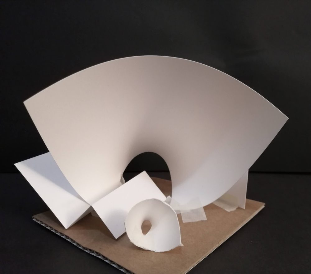 A paper construction with swooping and broken planes.