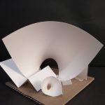 A paper construction with swooping and broken planes.