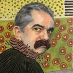 Portrait of a man with a mustache in front of a colorful pattern.