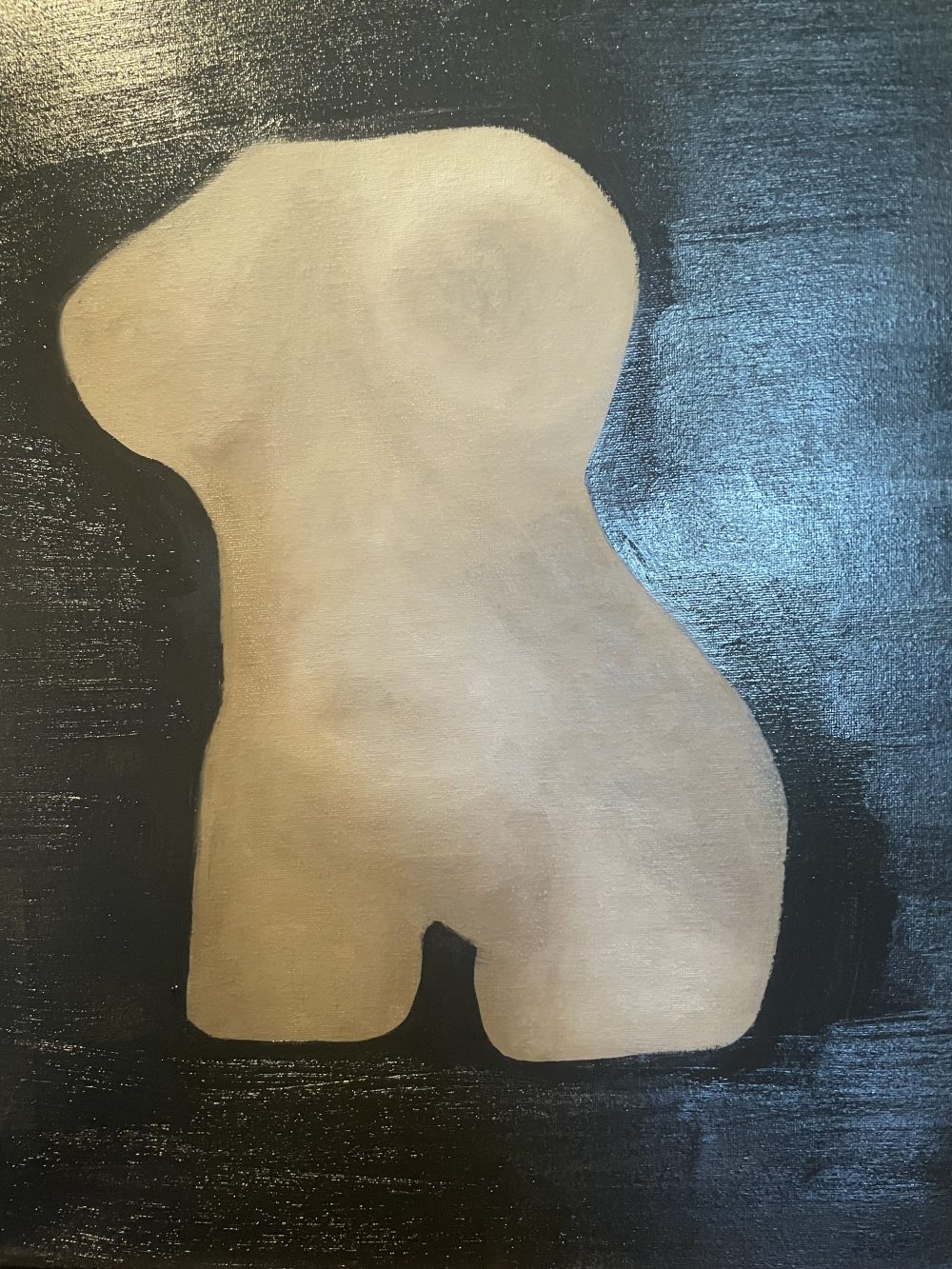 A painting or an armless, legless female statue, obscured by shadows.