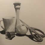 A still-life pencil drawing in black and white composed of a tall salt shaker in the background, overlaid by a ceramic mug, an apple being leaned on by a pair of scissors, and a small metal cup in the front.