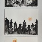 Ink block prints of trees, with sun peeking through them, rising.