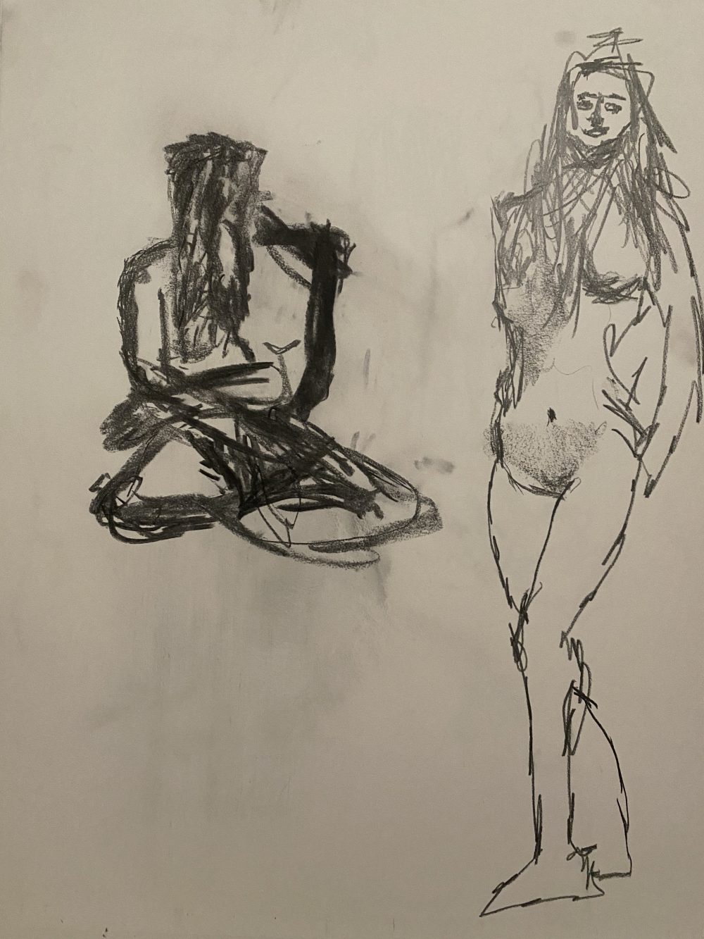 Drawing of a standing figure and a sitting figure.