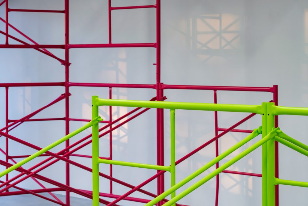 Pink and green scaffolding.