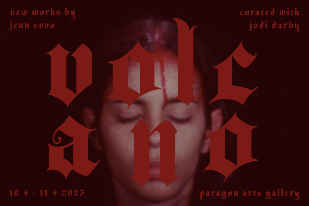 Photograph of a face with closed eyes and blood on the forehead against a black background. Red text is superimposed across the photograph stating Volcano, new works by Jenn Sova, curated with Jodi Darby, 10.4 - 11.4.2023, Paragon Arts Gallery.