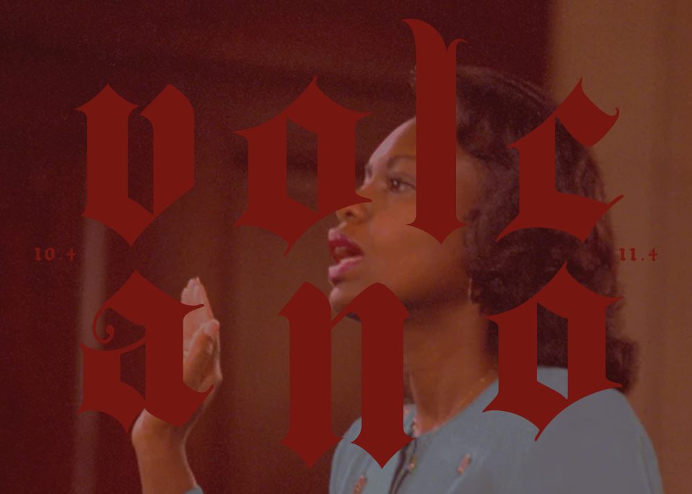 Photograph of a person speaking with her right hand raised. Red text is superimposed across the photograph reading Volcano, 10.4 - 11.4.