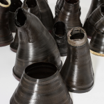 bronze colored sculptural pieces