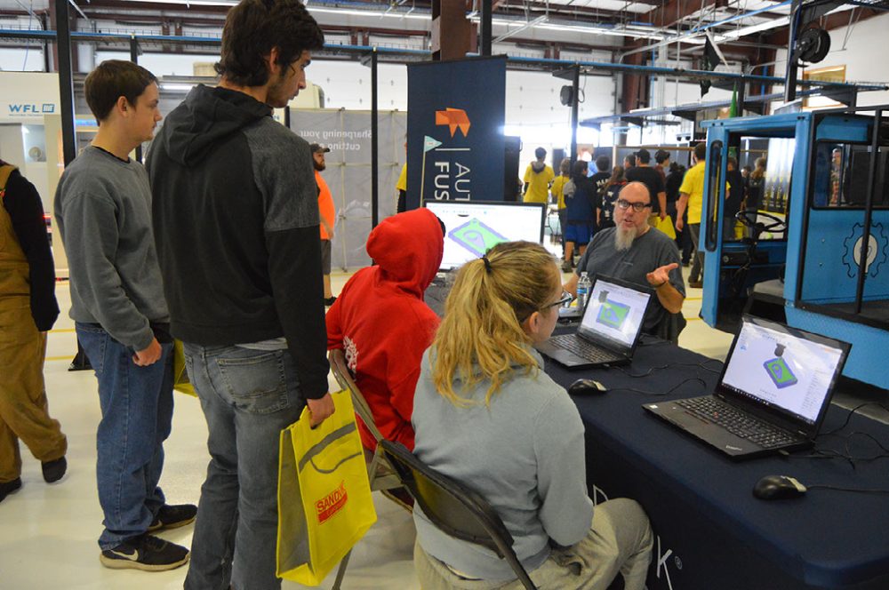 Students at computer demo.