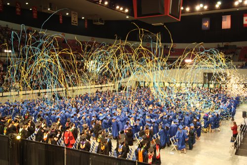 Students graduating with confetti