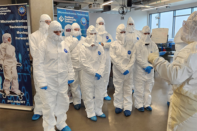 Microelectronics Technology students in lab suits