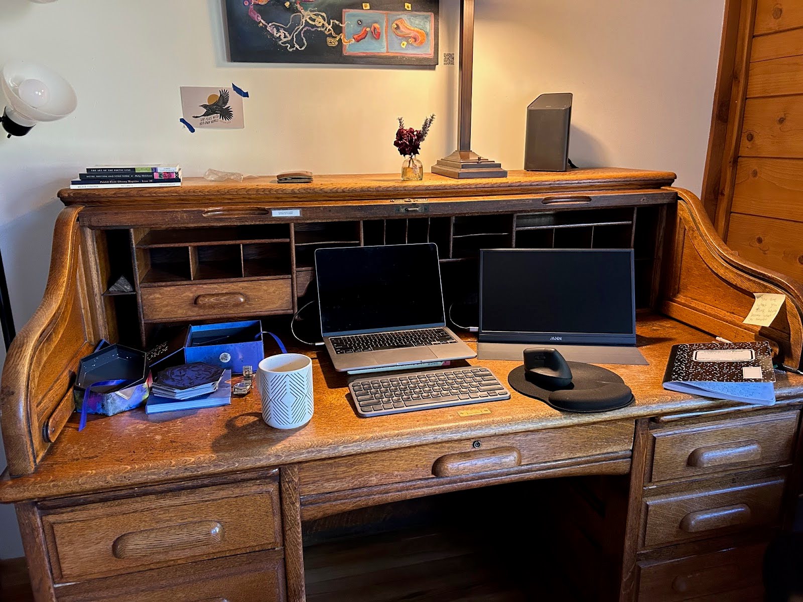 a desk with a laptop on it