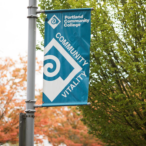 PCC-branded sign on campus with the words "community" and "vitality"