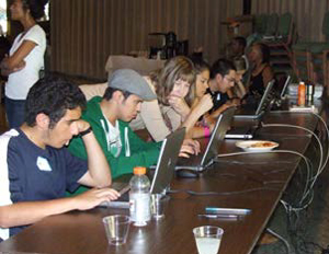 students working at computers on table