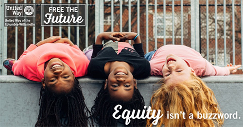 3 girls laying on their backs looking at the camera, with the words 'Equality isn't a buzzword' overlayed over the image