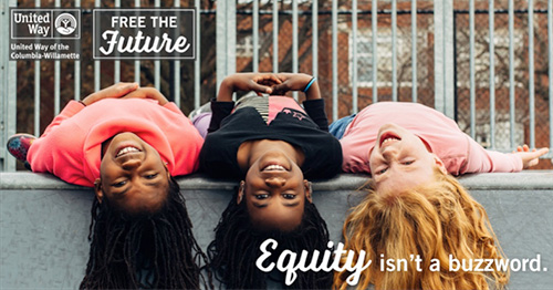 3 girls laying on their backs looking at the camera, with the words 'Equality isn't a buzzword' overlayed over the image