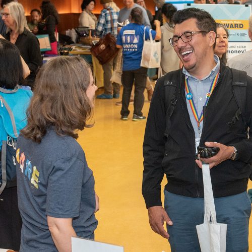 Staff members talking at In-service