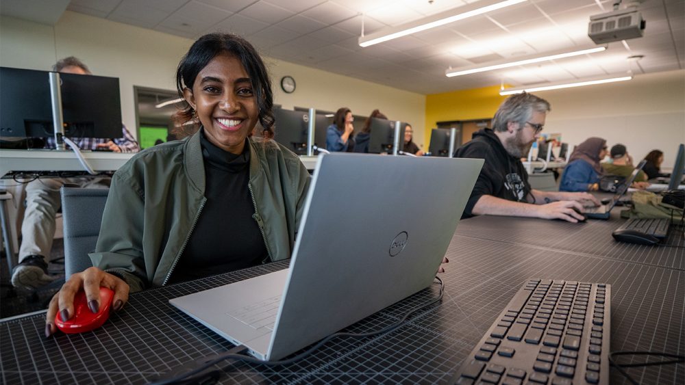 Students using computers in class