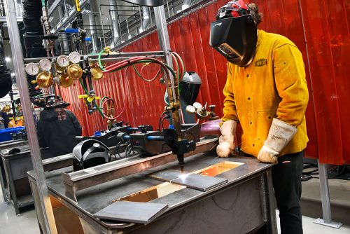 Students using equipment at the OMIC Training Center