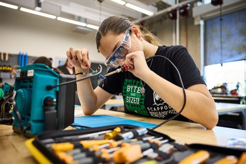 Fab Lab student working with electronics