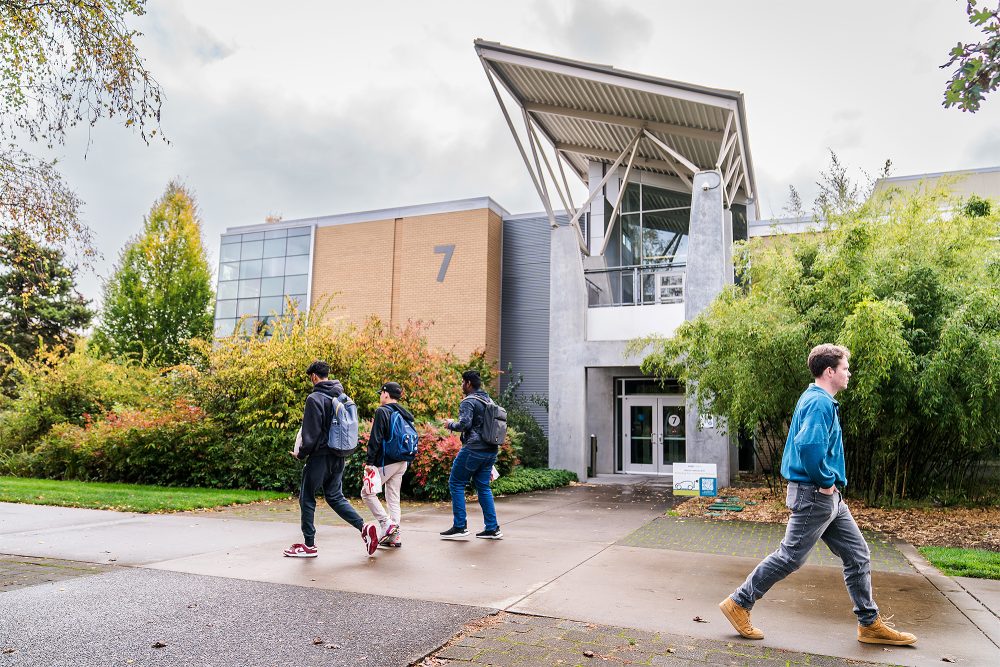 Students walking outside on campus
