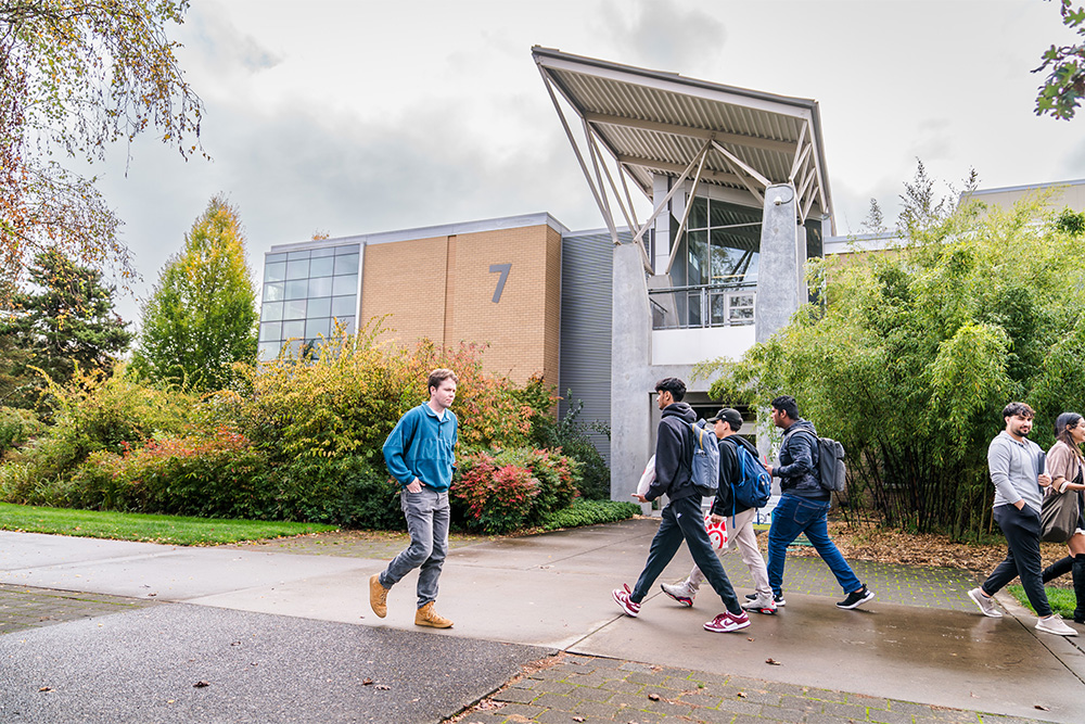 Students walking outside on campus