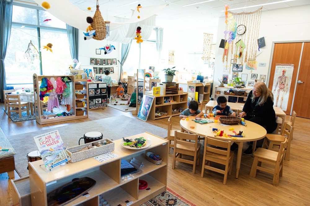 Kids and teacher in the Child Development Center
