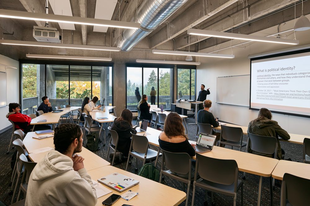 Students in a classroom with large windows