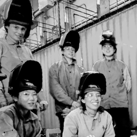 Students wearing welding gear