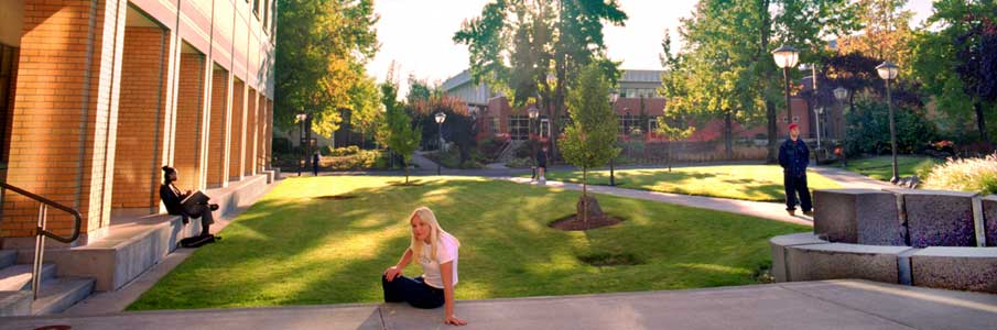 Sunny campus quad with students