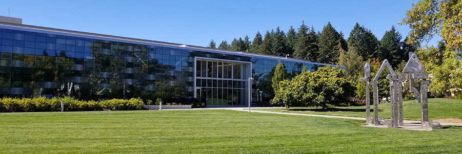 Building 7 from the outside, with a sculpture in the foreground