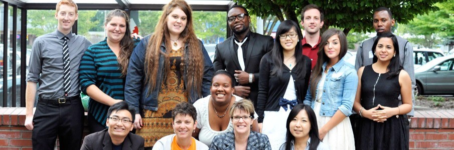 A diverse group of students in campus quad