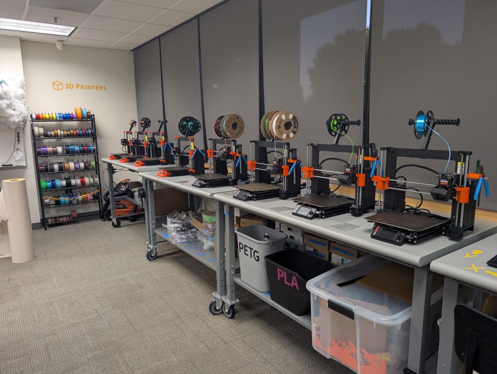 A row of 3D printers