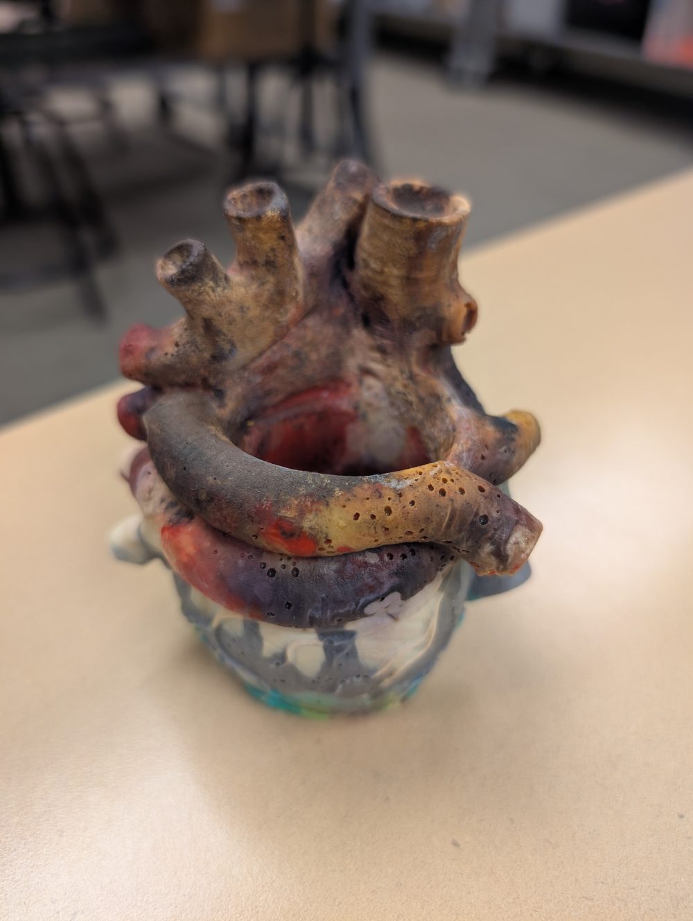 A recycled filament heart-shaped plant pot