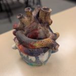 A recycled filament heart-shaped plant pot