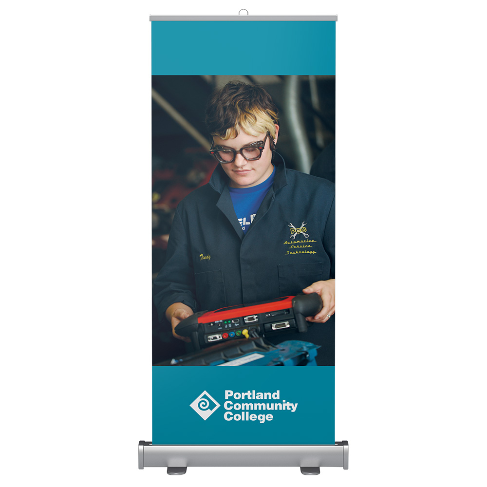 Standard banner stand with student automotive worker