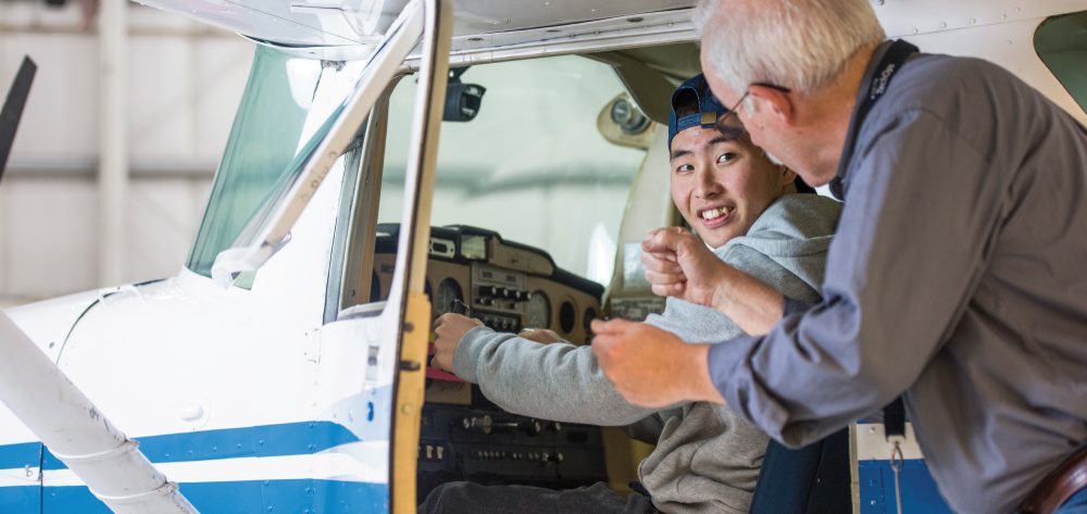 PCC aviation student working with faculty