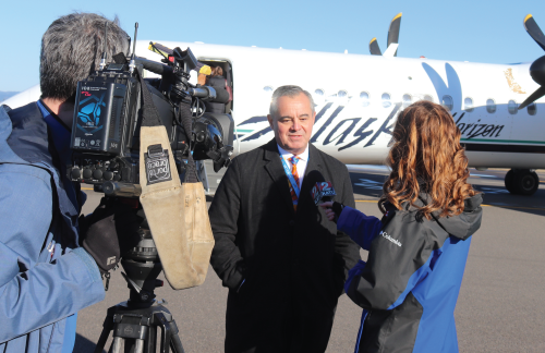 Photo featuring a news team interviewing Horizon Air’s Director of Line/Base Maintenance and Student Development, Archie Vega.