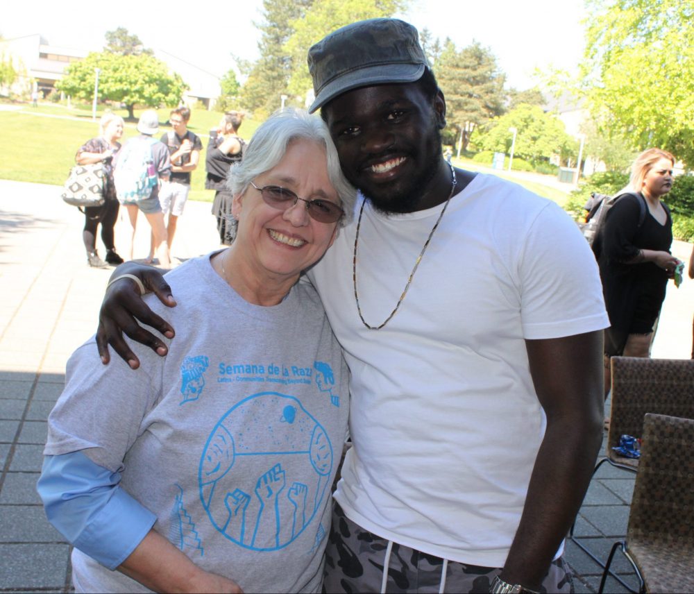 Two people smiling together at an MC event