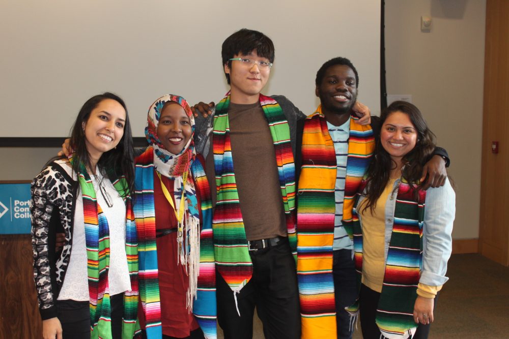 Students wearing matching scarves