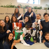 PCC staff display collected socks that will go to the homeless.